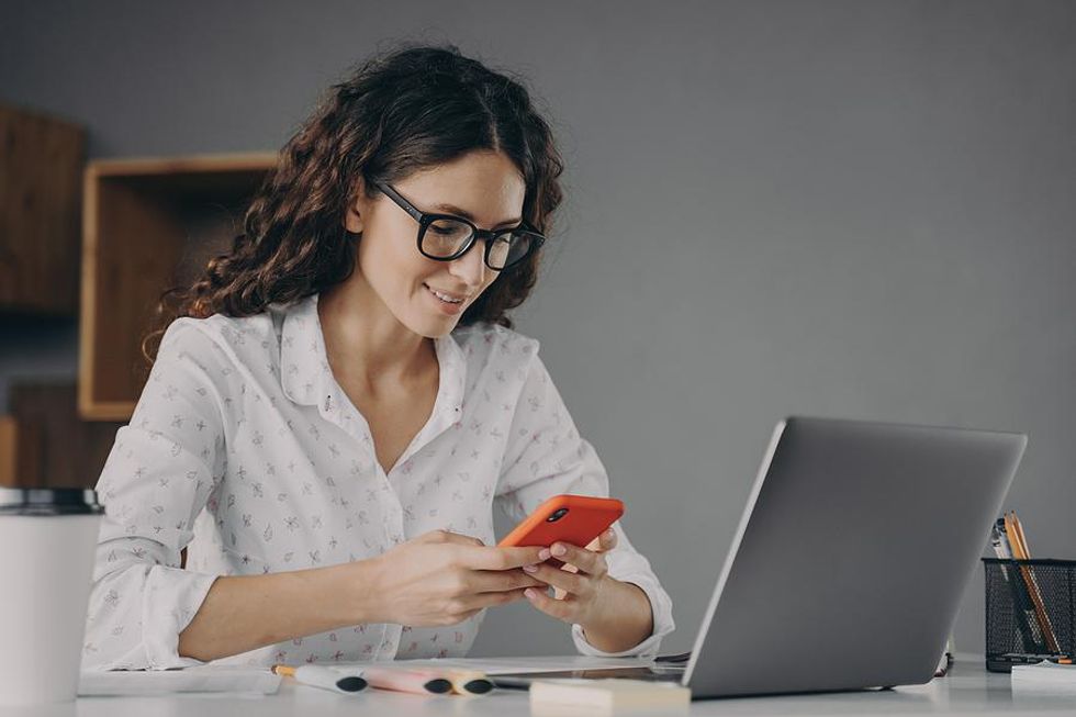 Woman practices leaving a voicemail for a job