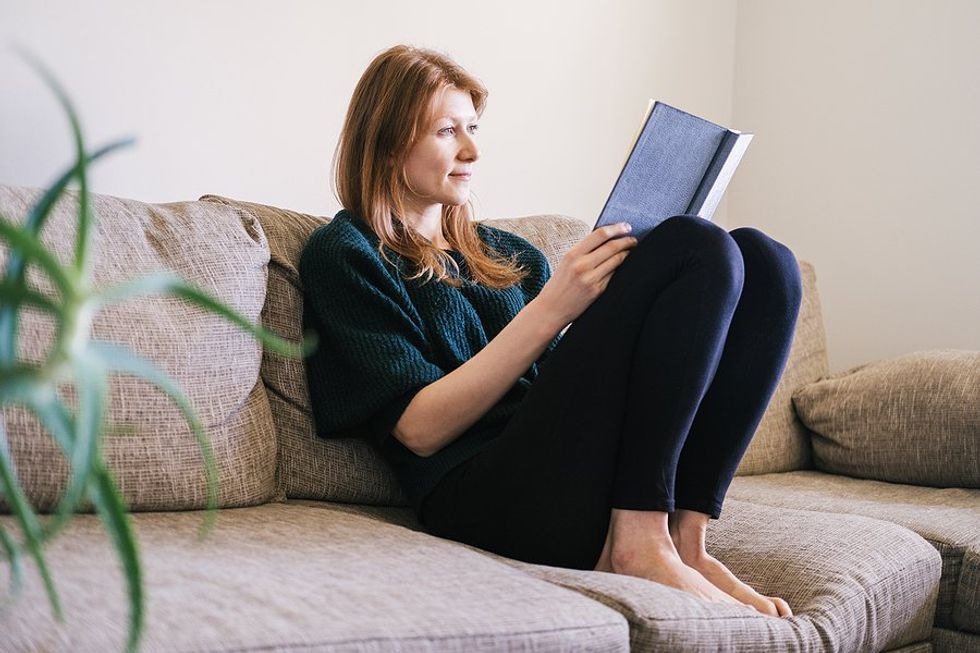 Woman reads a book