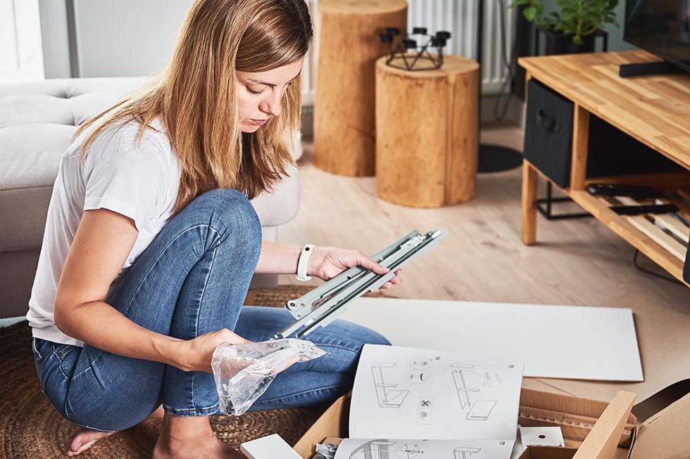 Woman reads a manual