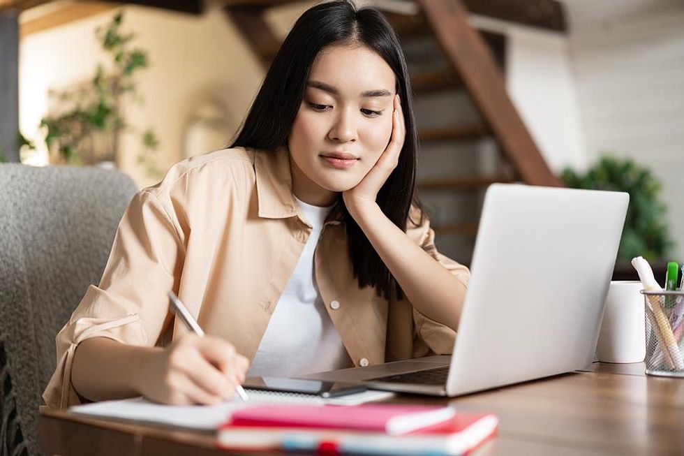 Woman researches the company before her job interview