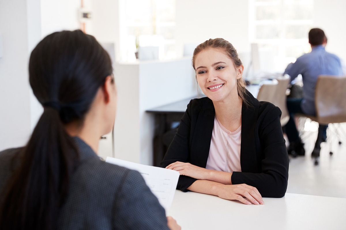 Woman smiles during a job interview