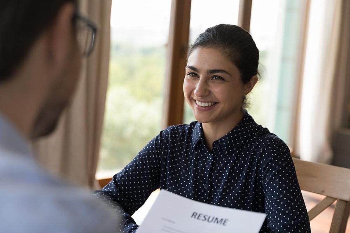 Woman smiles during a job interview