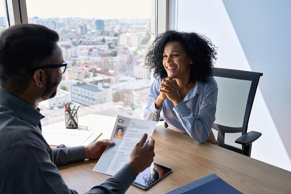 Woman smiles during her job interview