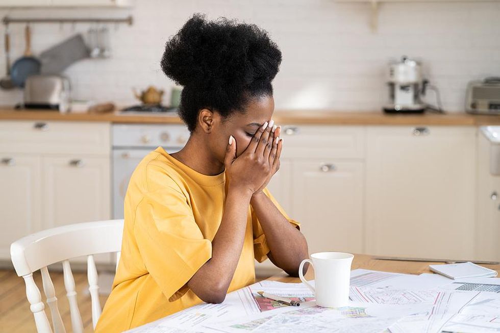 Woman stressed about getting laid off