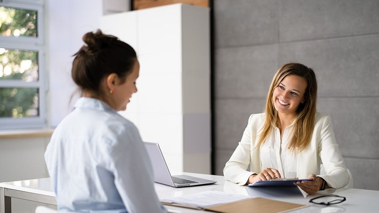 Woman talks about salary during a job interview