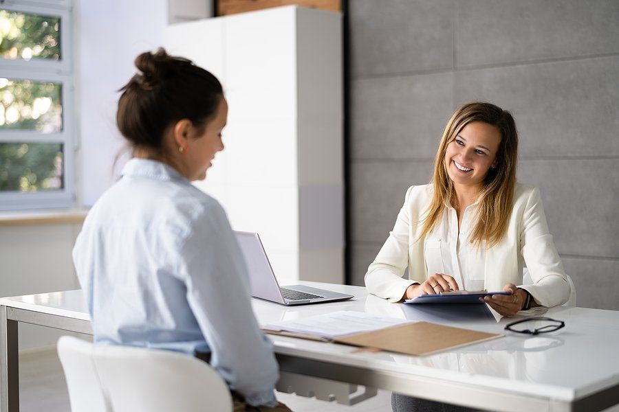 Woman talks about salary during a job interview