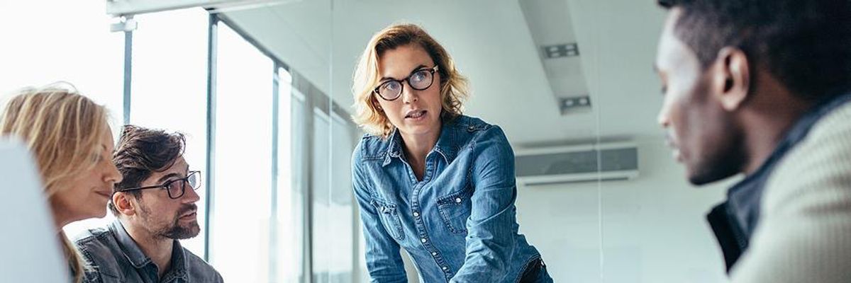 Woman talks during a meeting