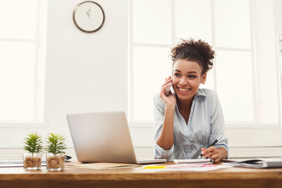 Woman talks during a phone interview