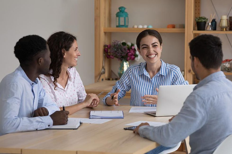 Woman talks during a work meeting