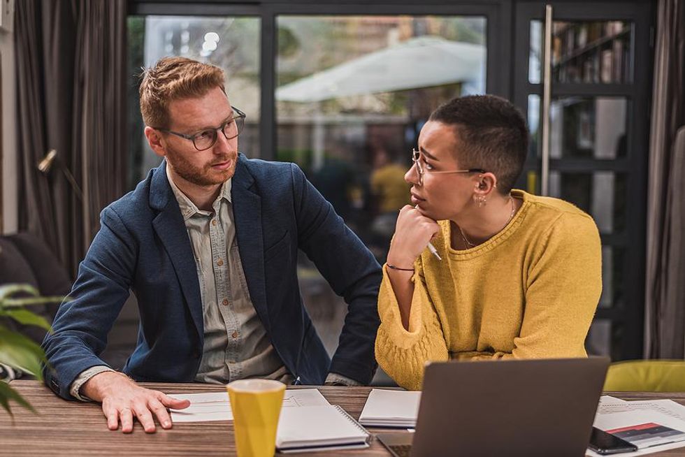 Woman talks to a condescending coworker