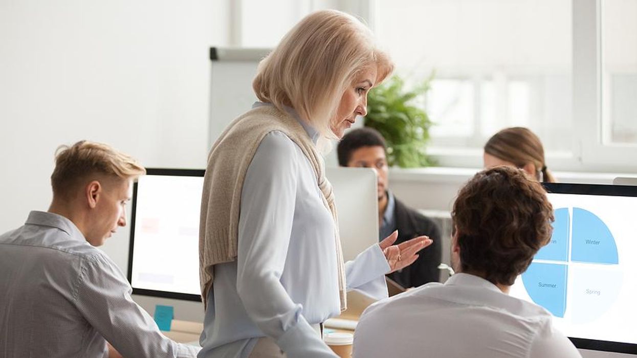 Woman talks to a difficult coworker at work