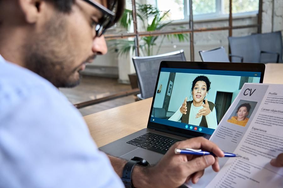 Woman talks to a recruiter during a video call