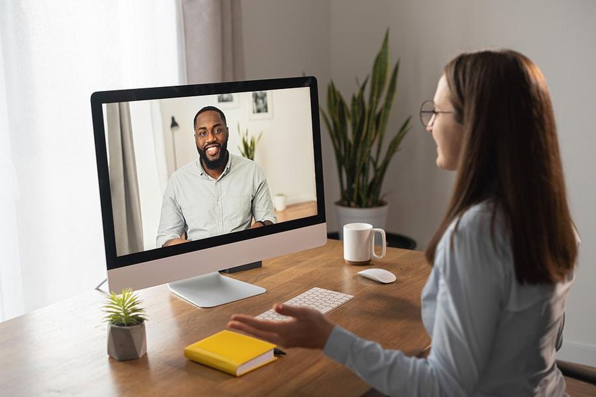 Woman talks to a recruiter via a video call