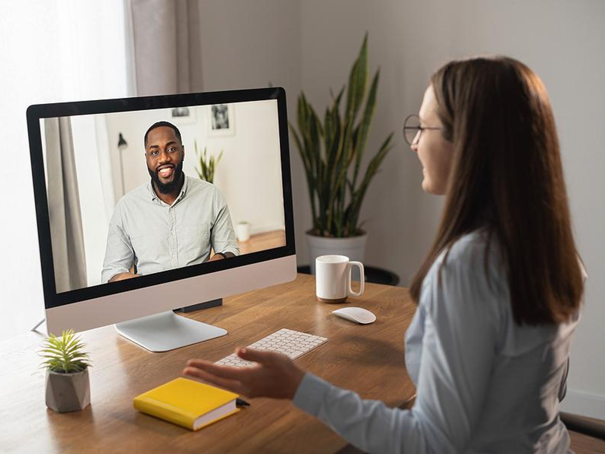 Woman talks to a recruiter via a video call