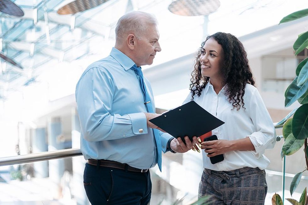 Woman talks to her boss about difficult customers/clients