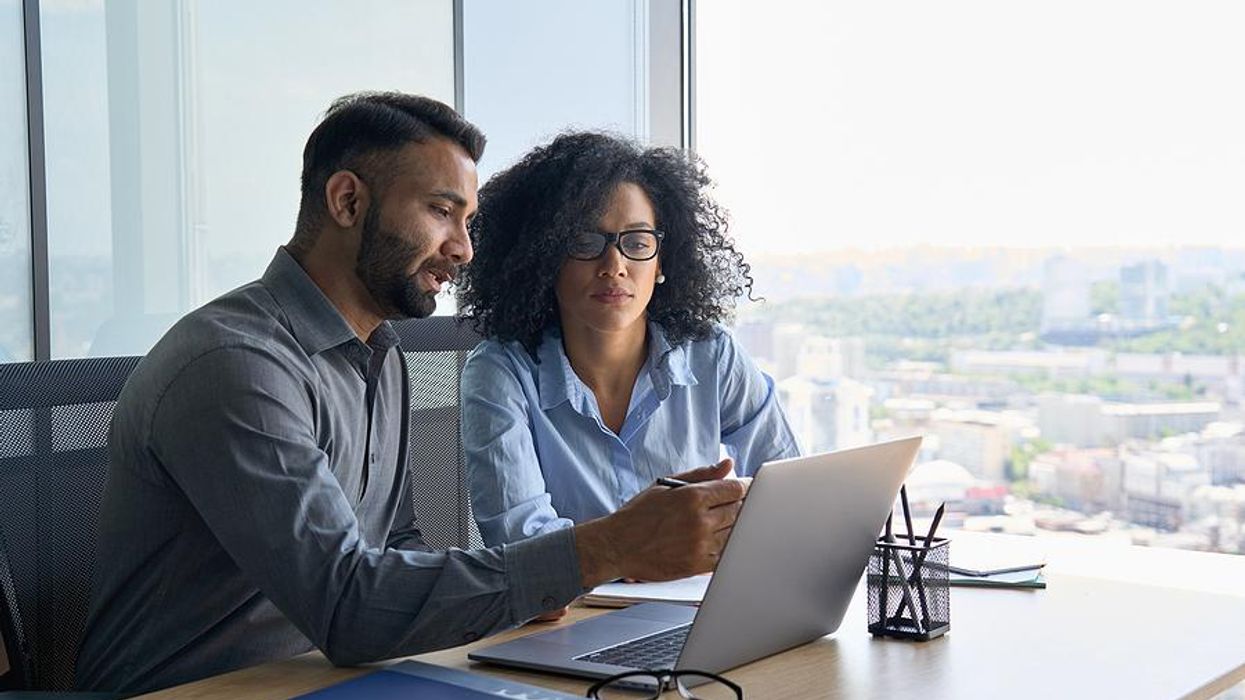 Woman talks to her boss about resetting work expectations