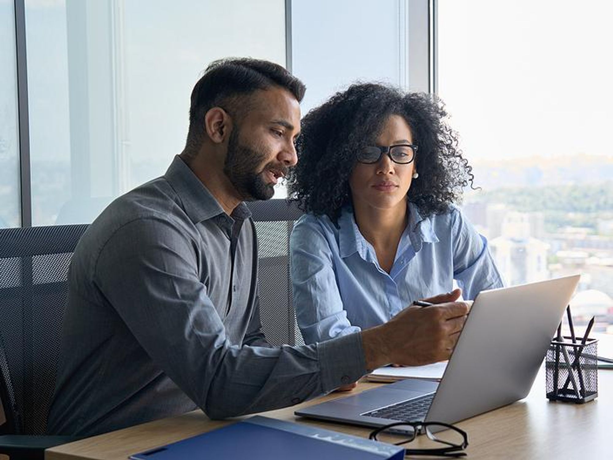 Woman talks to her boss about resetting work expectations