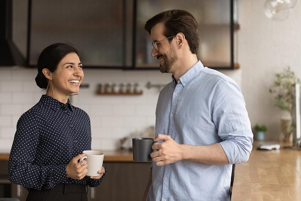 Woman talks to her boss at work