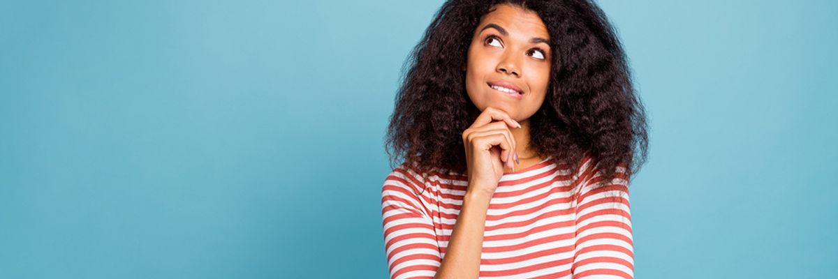 Woman thinking about her career goals