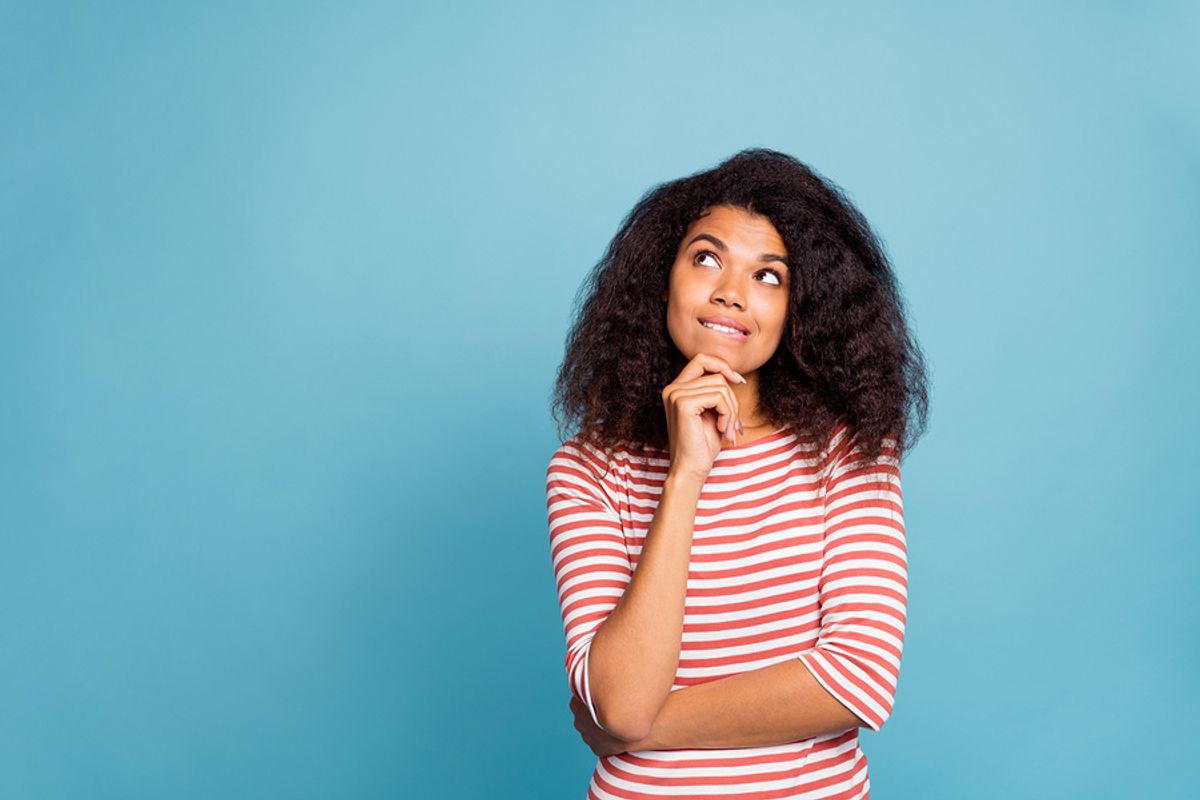 Woman thinking about her career goals