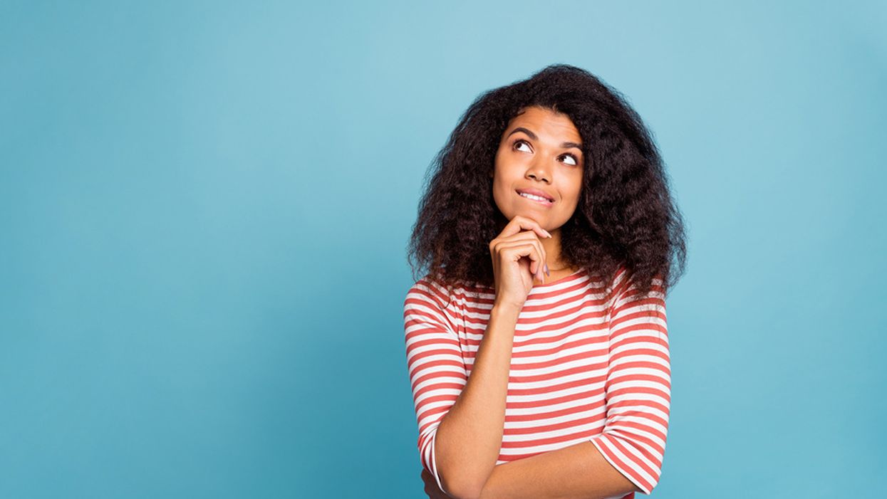 Woman thinking about her career goals