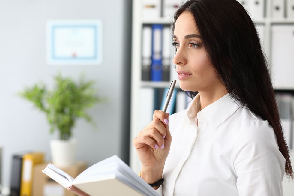 Woman thinking about her career story.