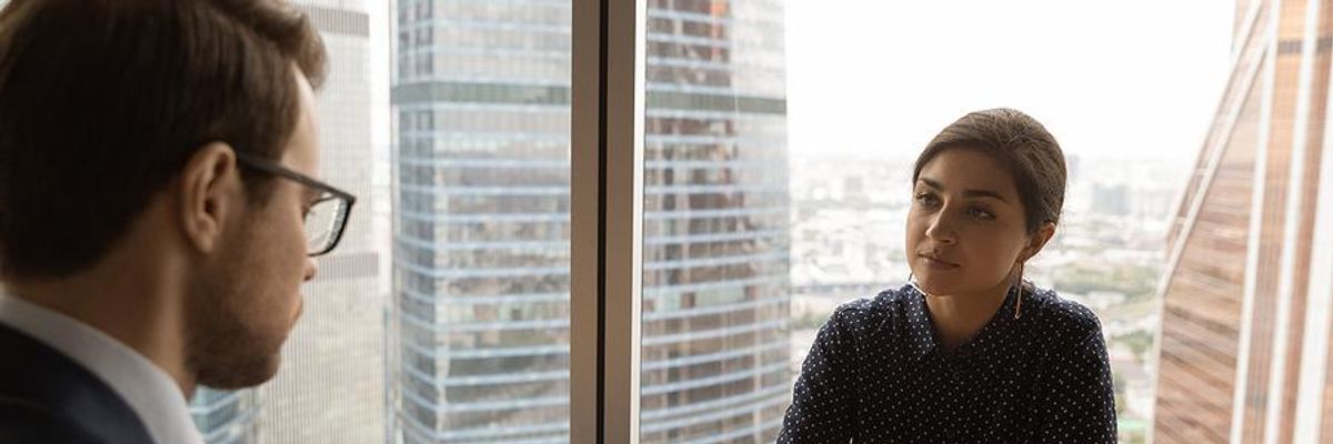 Woman thinks about accepting a job offer
