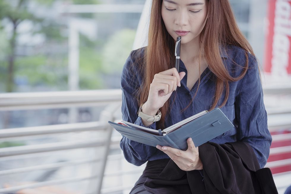 Woman thinks about and plans her day