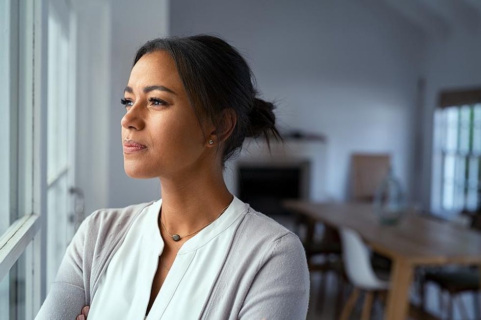 Woman thinks about her future and considers what life would be like if she got her dream job