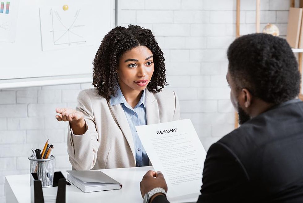 Woman tries to beat the competition in a job interview