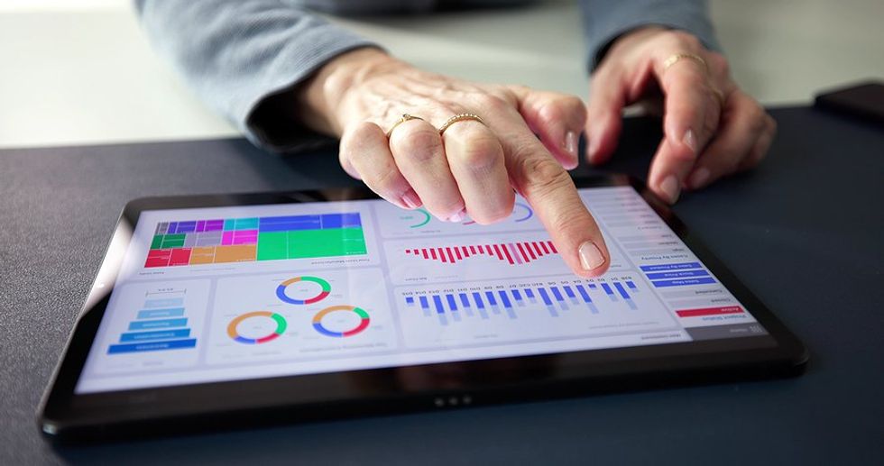 Woman using KPI dashboard