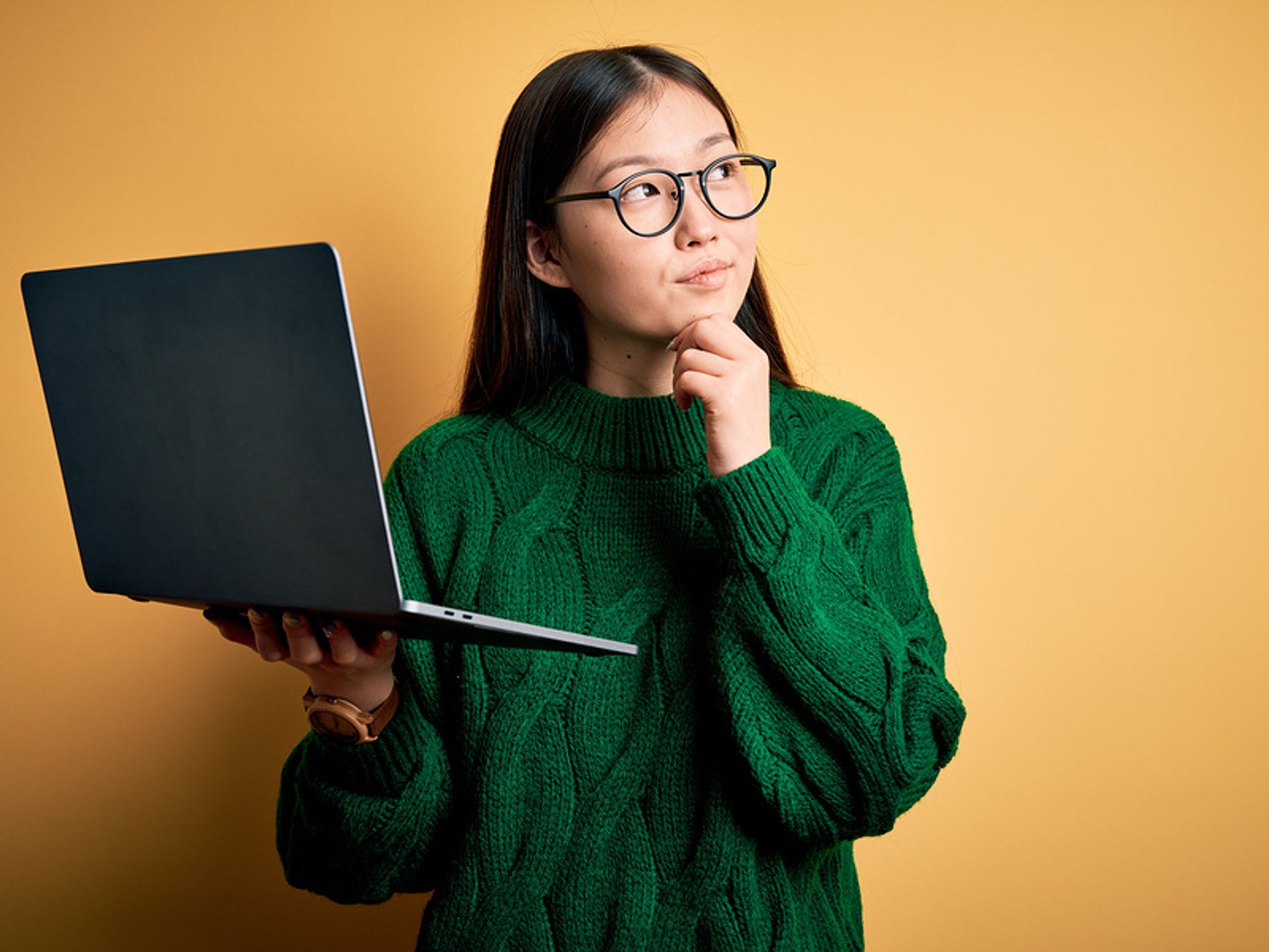 Woman wondering how she should format her resume