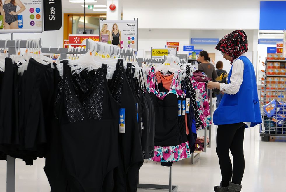 Woman working an entry-level retail job