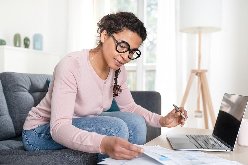 Woman works her nonprofit job from home