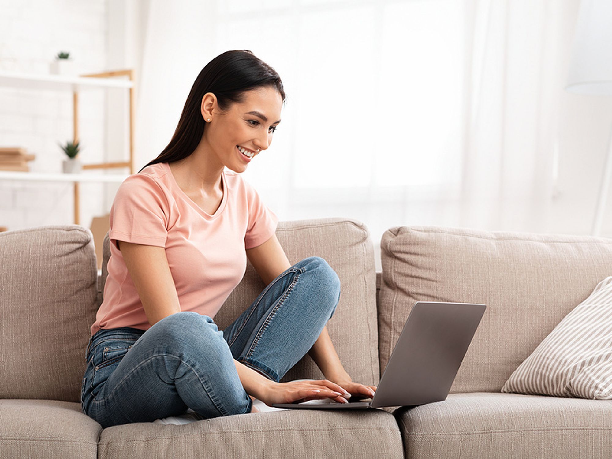 Woman writes her LinkedIn profile while unemployed