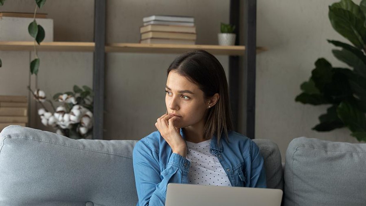 Worried woman thinks about quitting her job