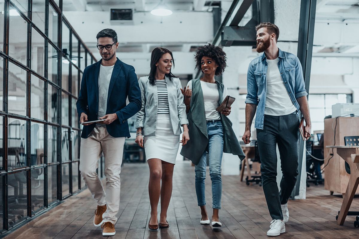 Young employees/coworkers staying active at work