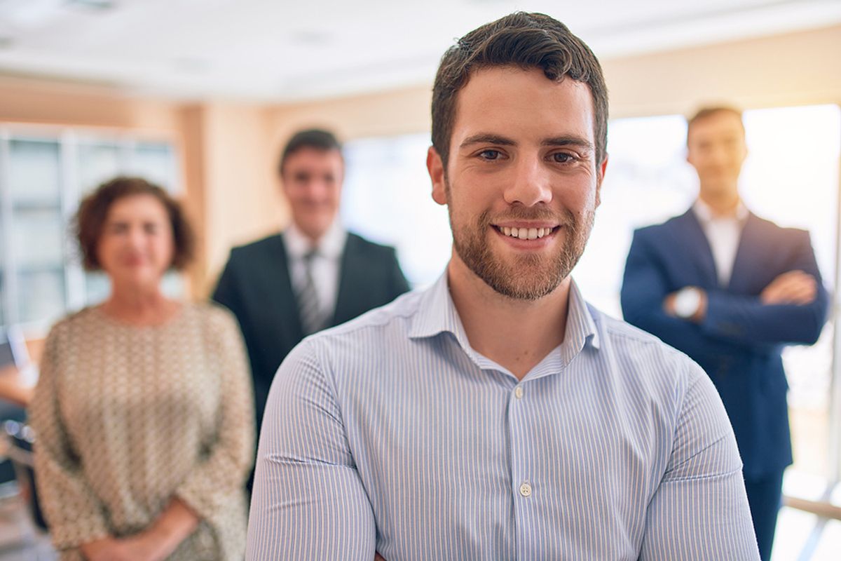 Young executive in a meeting with other executives