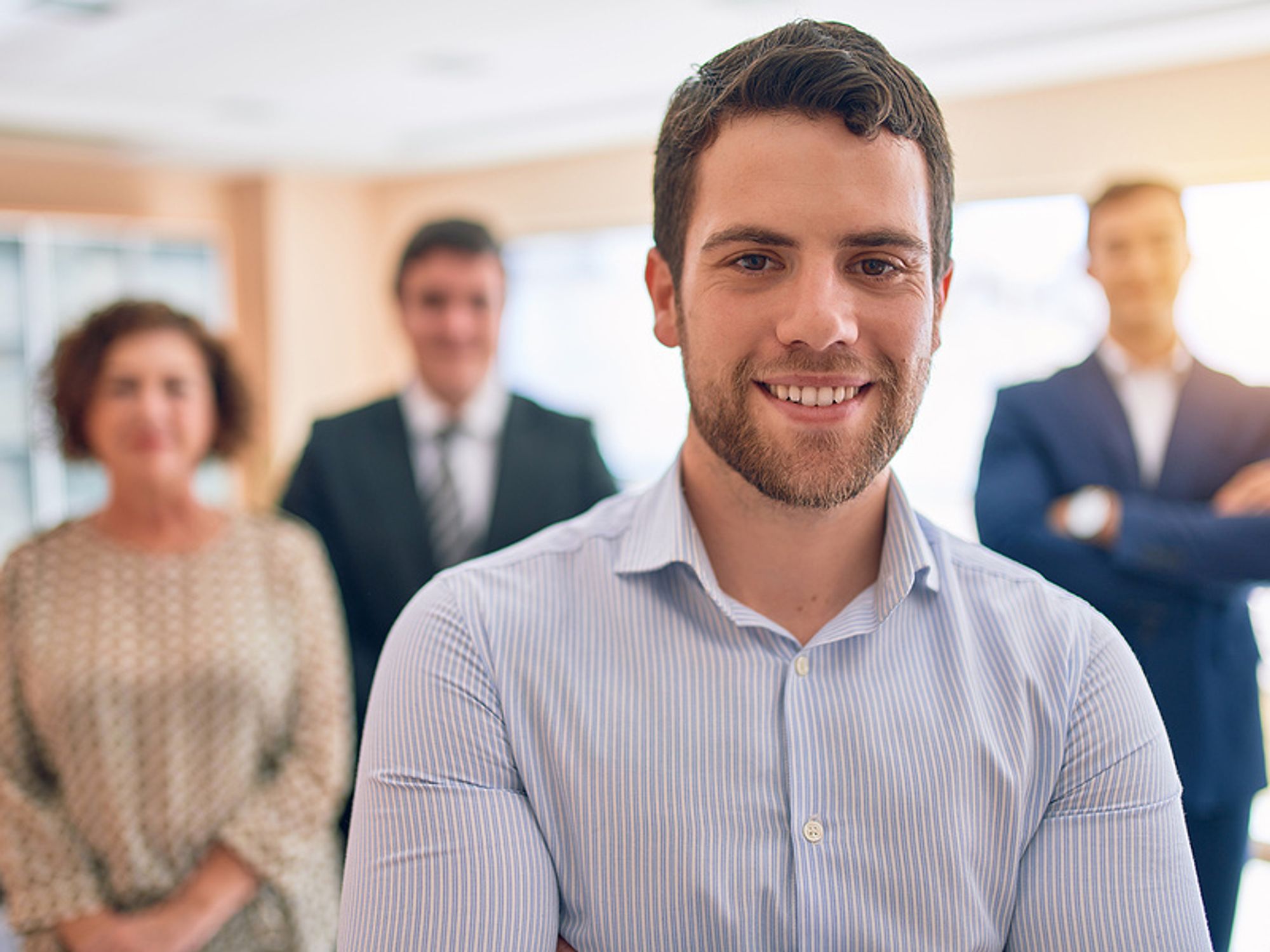 Young executive in a meeting with other executives
