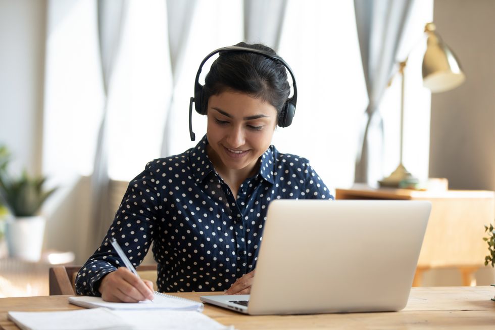 Young professional take part in an online career course.
