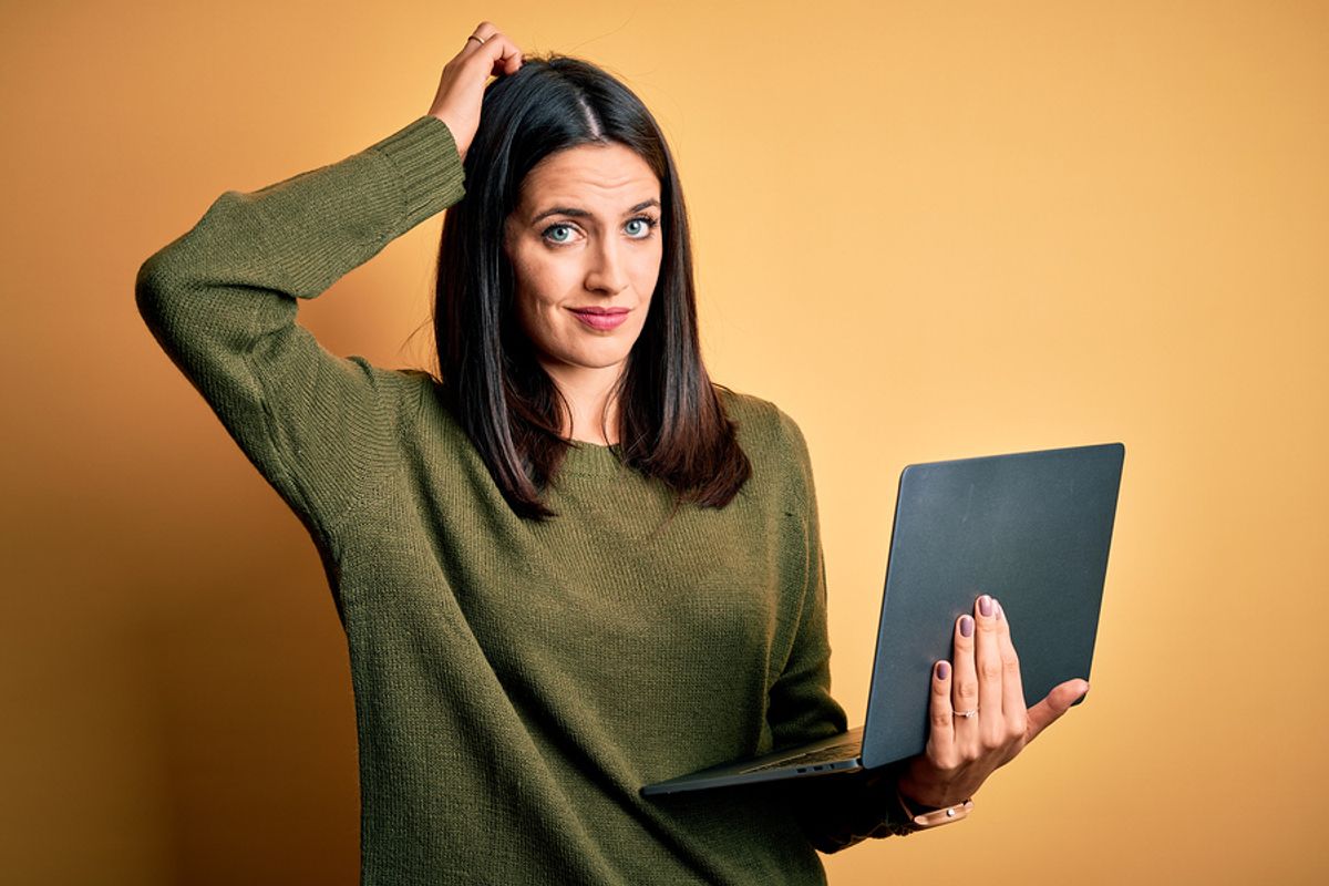 Young professional thinks about changing careers following a layoff.