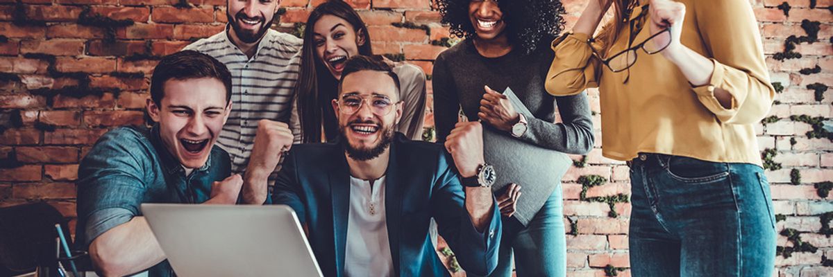 Young professionals show enthusiasm over their workplace.