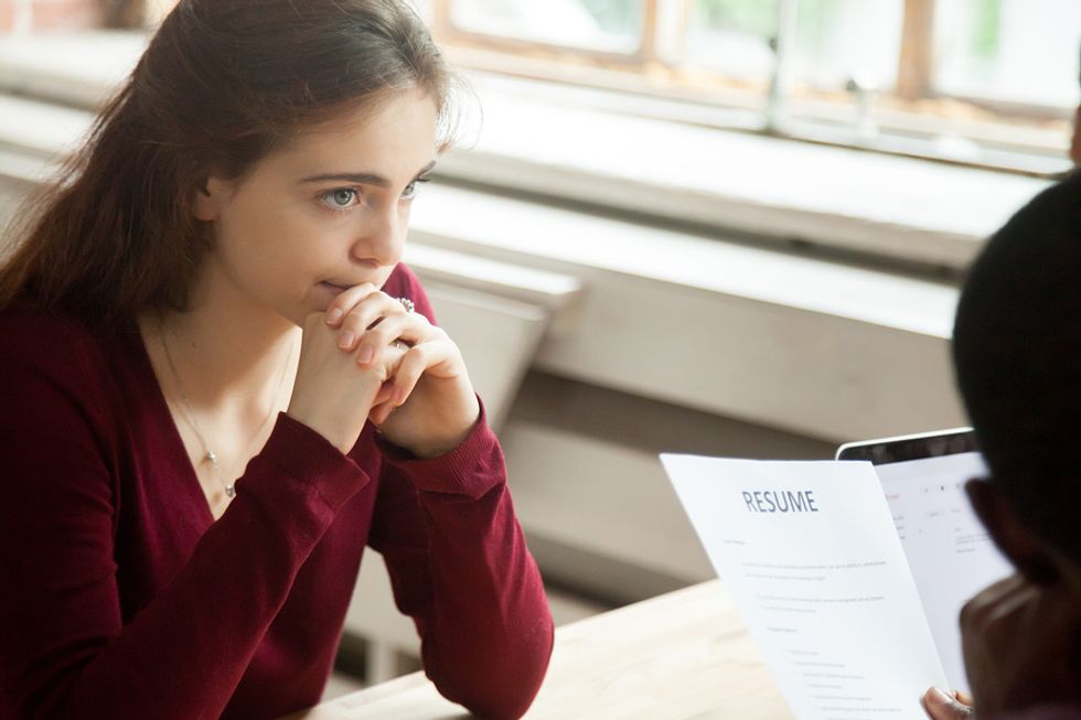 Young woman and HR manager discuss the next steps after she is rejected from a job she applied to