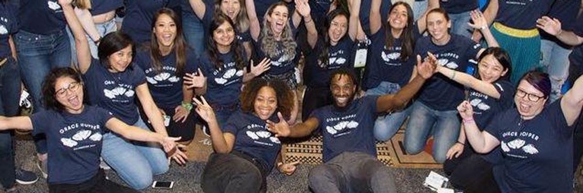 Zillow employees take a team photo.