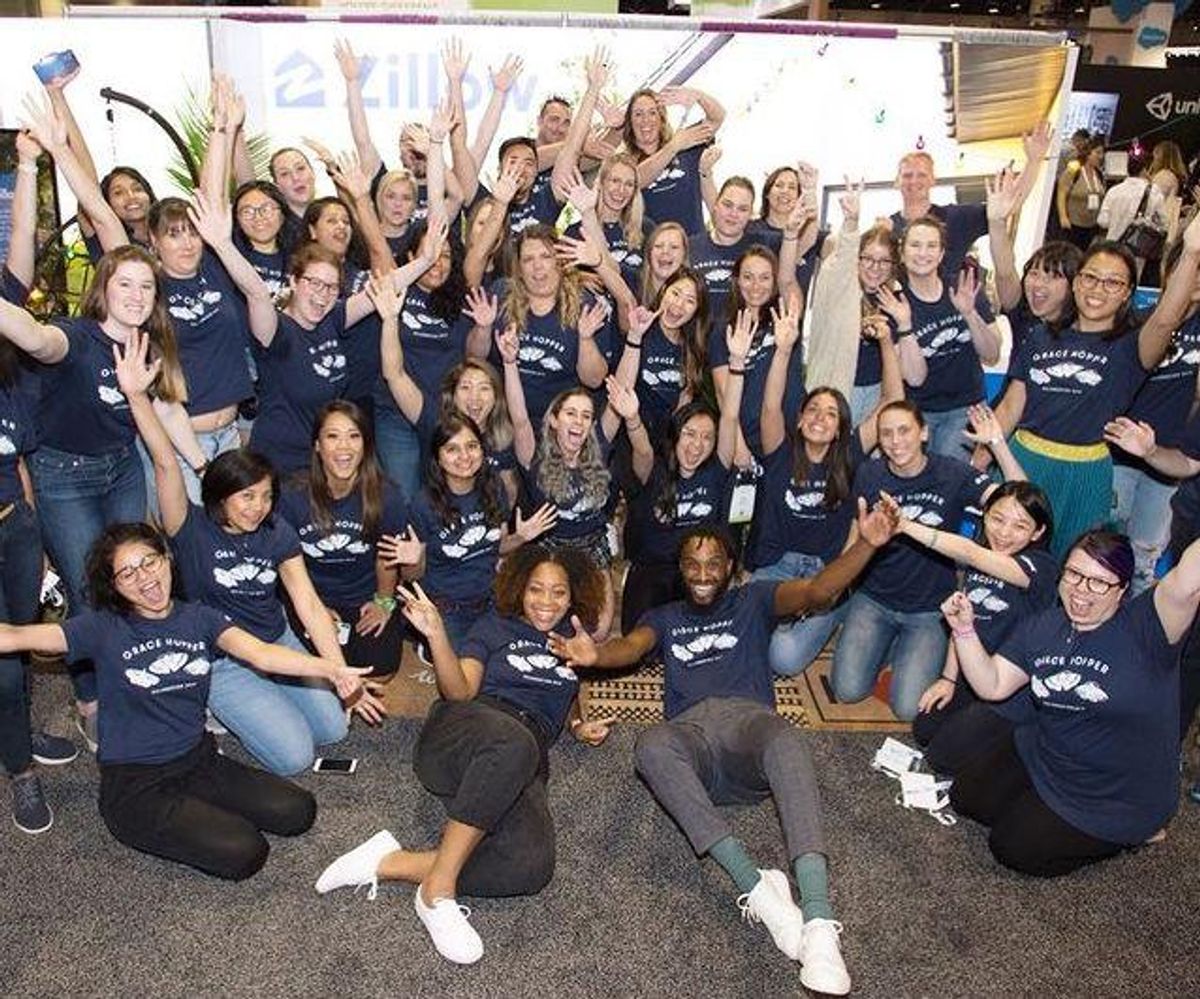 Zillow employees take a team photo.