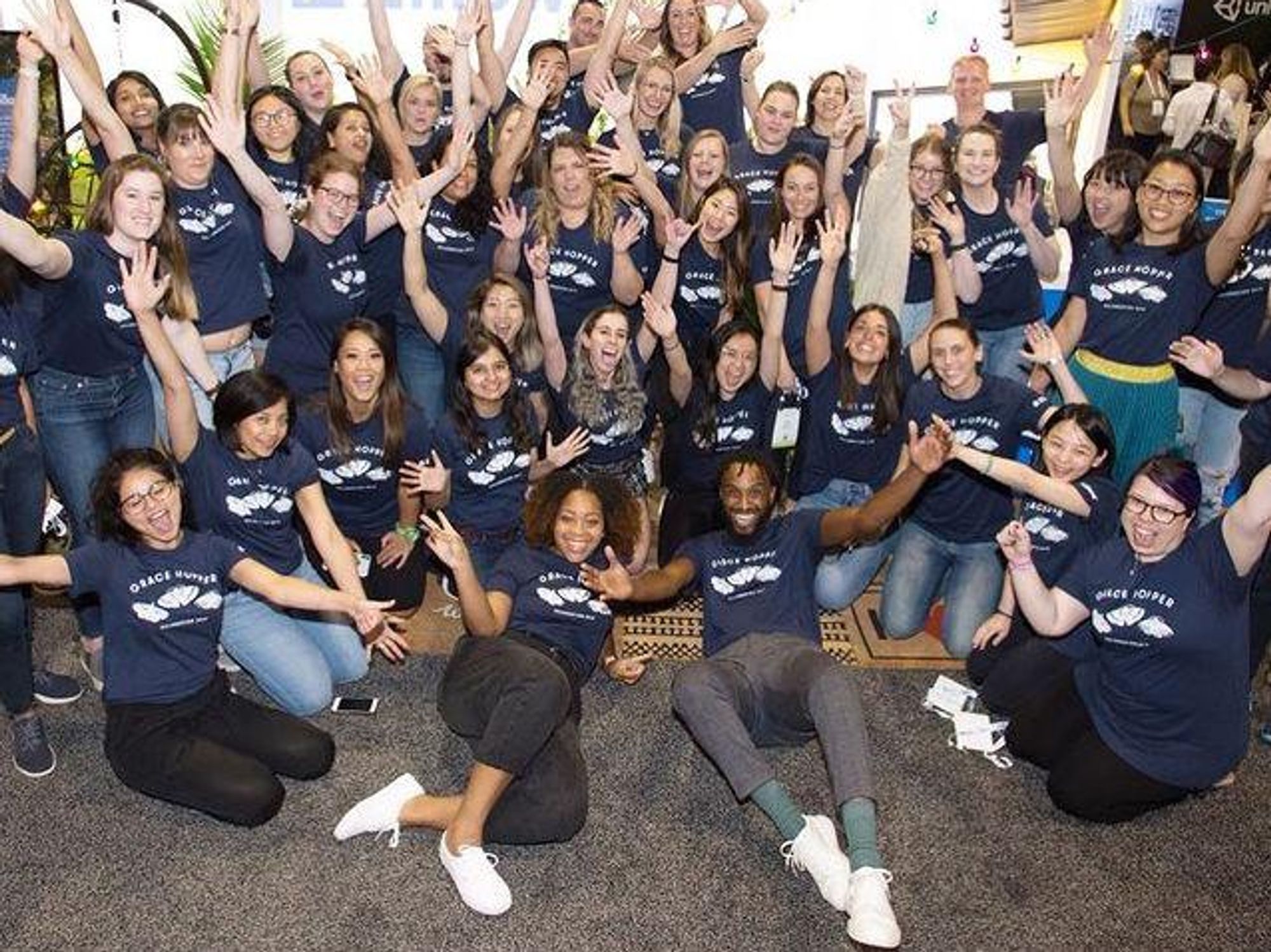 Zillow employees take a team photo.
