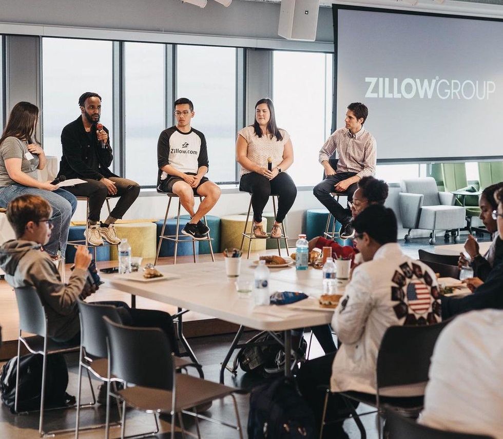 Zillow employees take part in a panel discussion.